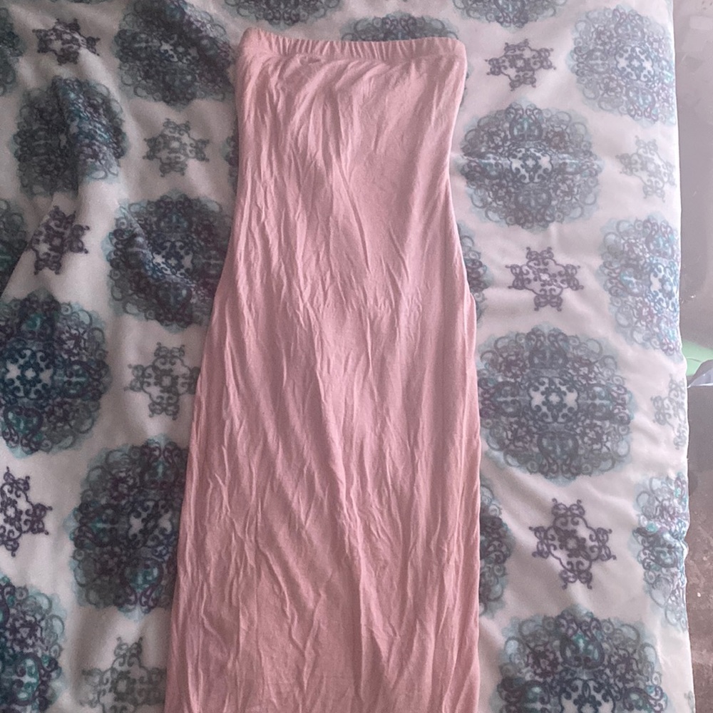 Light pink peach colored dress.